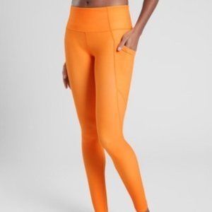Athleta Stash Pocket Salutation Tight